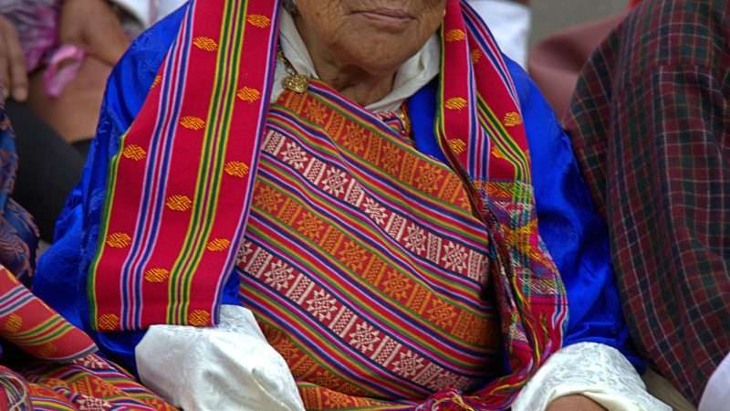 Grandmother watching the dances at Thimphu Tshechu