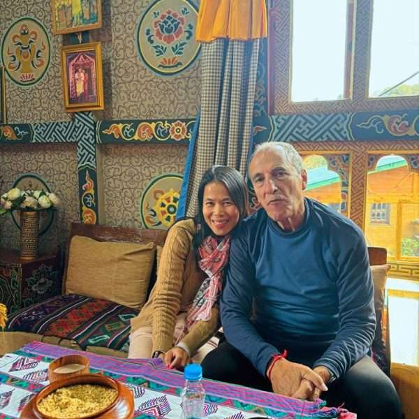 Couple from Italy visiting local home for authentic Bhutanese lunch