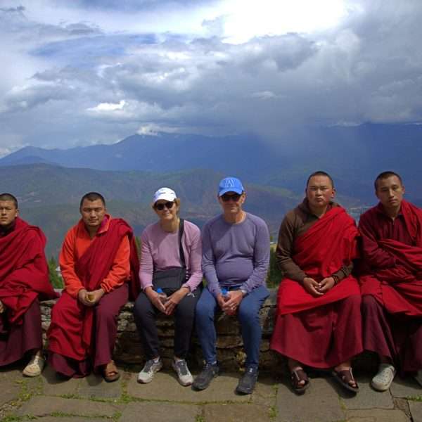Couple from Australia with monks at Talo Monastery