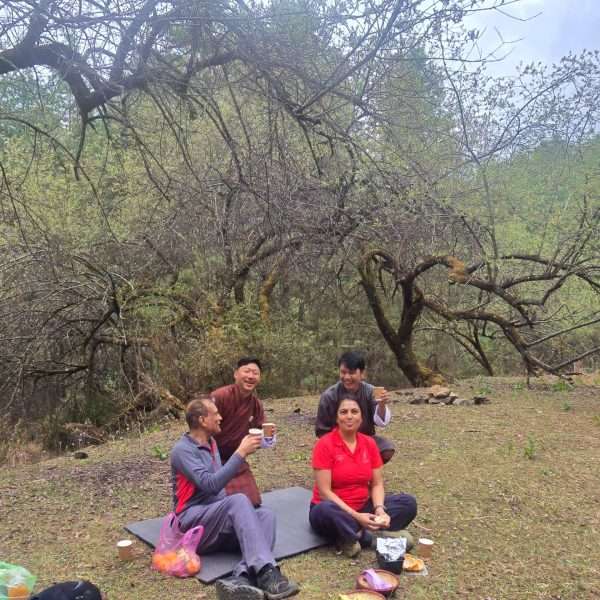 Guests from Unitied Kingdom having Picnic lunch on the way to Phojoding Monastery